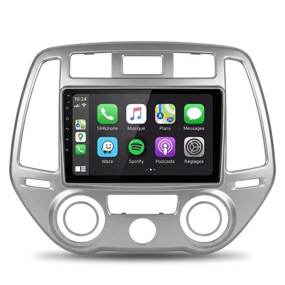 Autoradio CarPlay Android Auto Hyundai i20 (2008-2014), écran tactile 9 pouces et façade argentée spécifique i20, vue de face sur fond blanc
