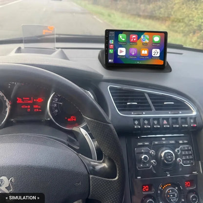 Simulation : écran CarPlay 9 pouces installé en haut de la planche de bord d'une Peugeot 3008 à navigation WIP Nav, poste et climatisation d'origine conservés dans la console
